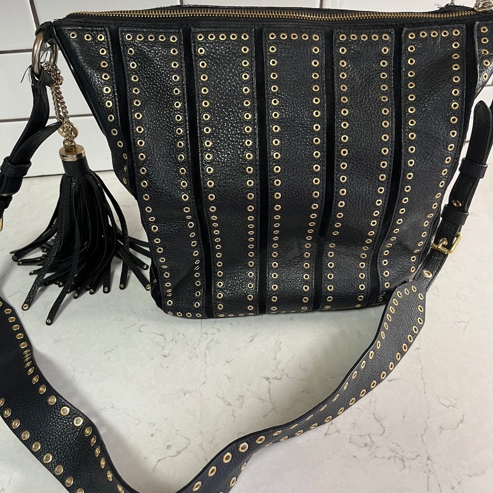 Micheal Kors leather gold studded hand bag. Like new
